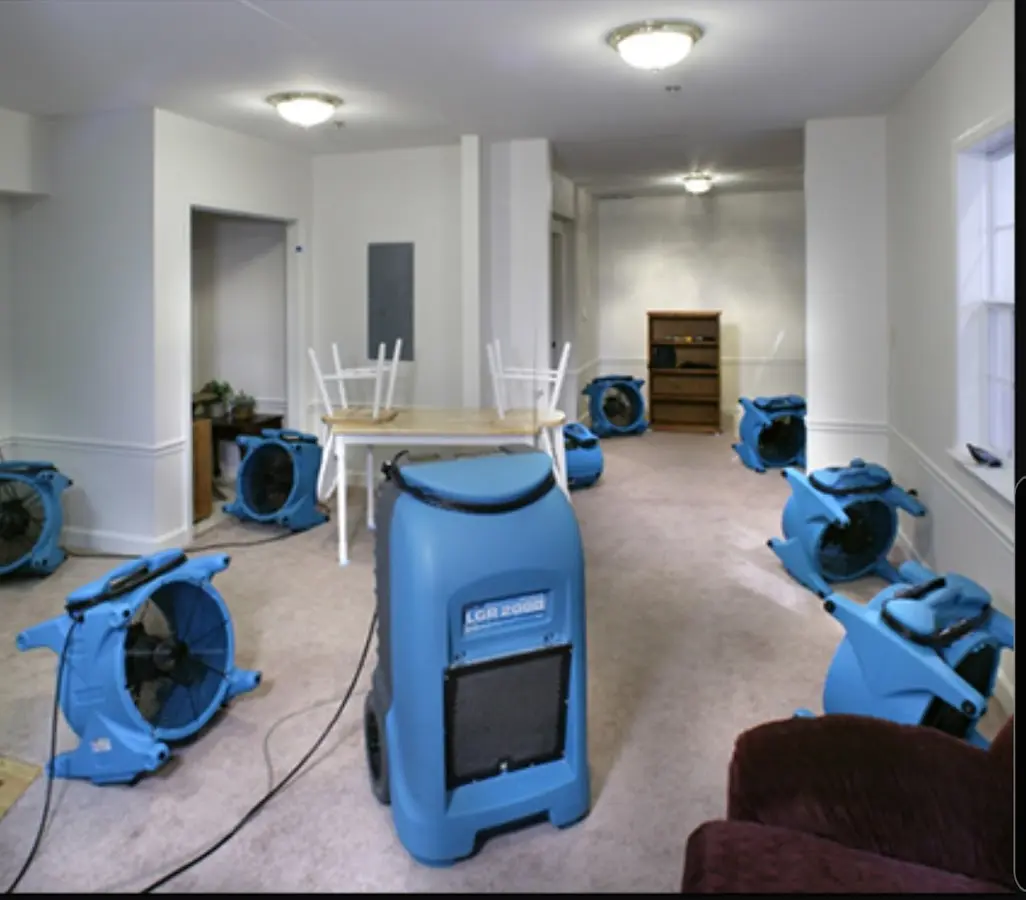 Air movers and dehumidifier setup for Water Damage Restoration in Clarksville